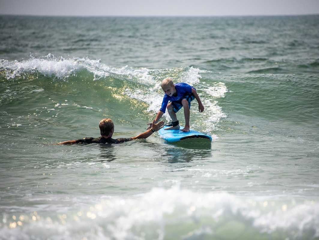 young girl surfing